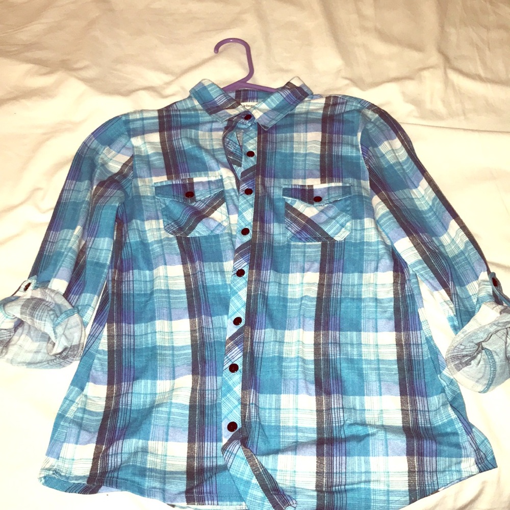 Blue flannel button down shirt.